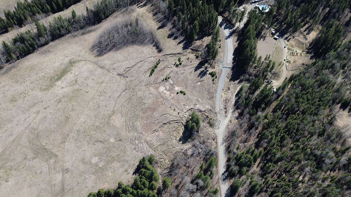 An aerial view of Durrell Road and slide damage from spring 2021. The project team was on-site carrying out inspections. April 22, 2024