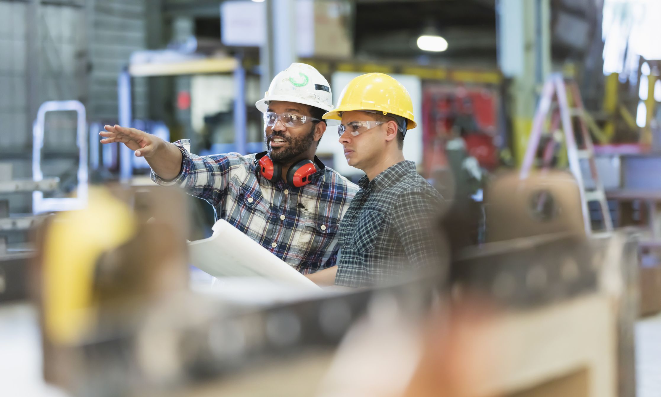 two manufacturing workers