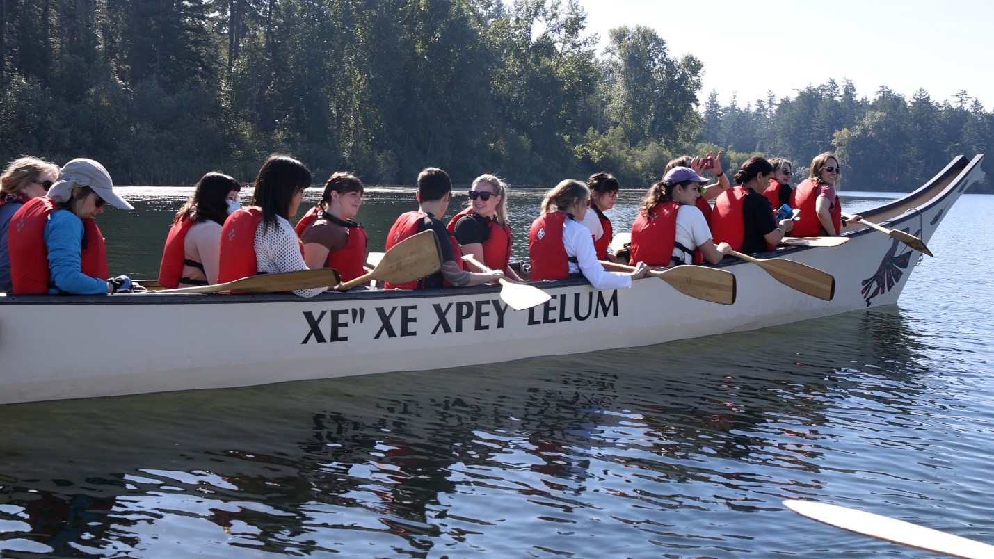 Recipients participating in a canoeing activity as part of the program