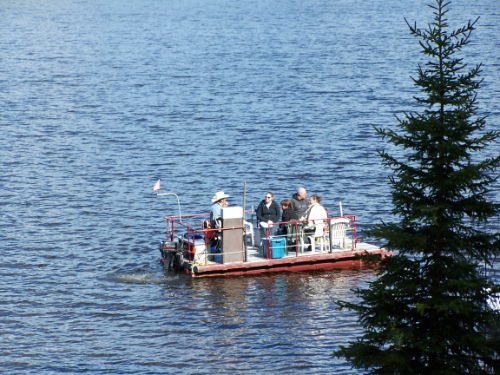 Community meeting held on a boat on Bednesti Lake