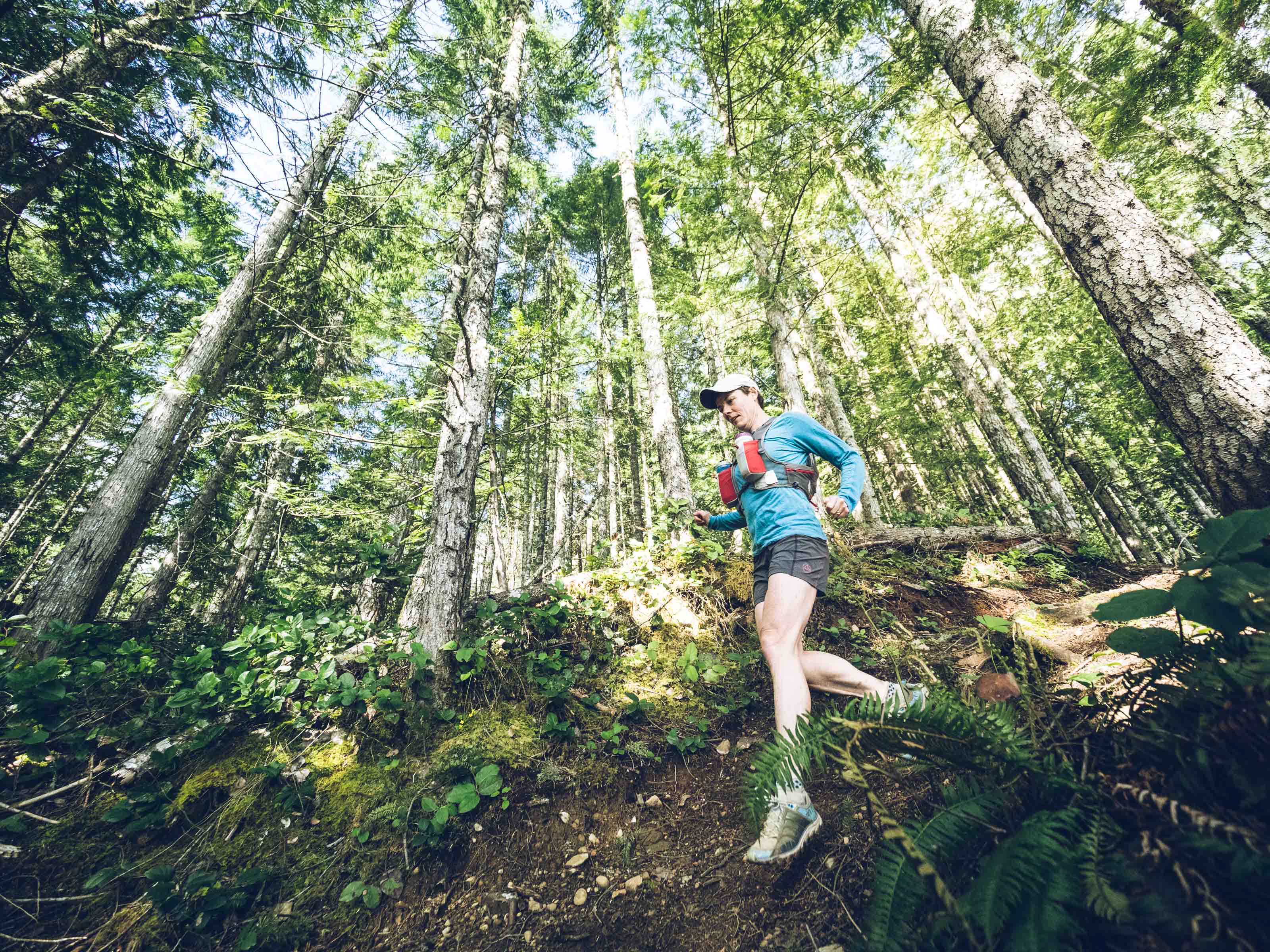 woman running on trail in Cumberland, B.C. 