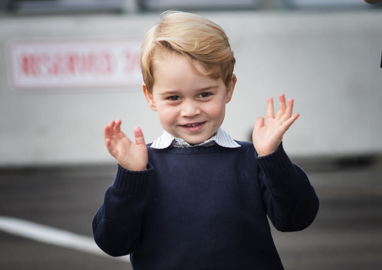 Prince George waves to crowds before leaving Victoria for home