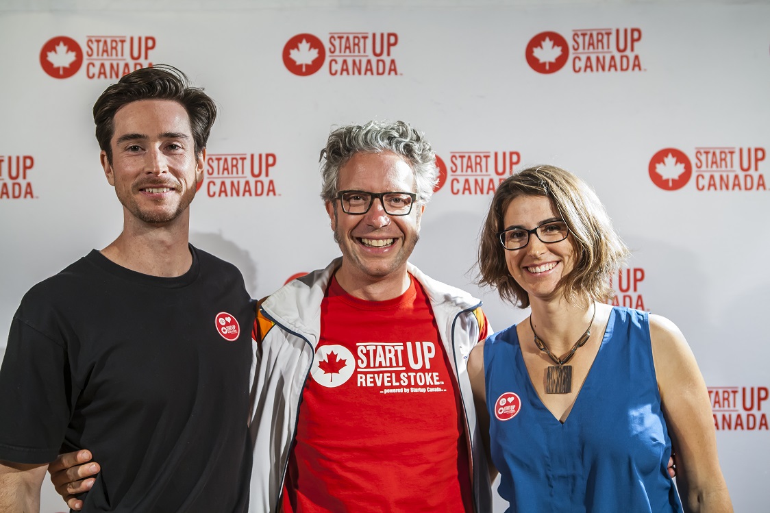 three people smiling at startup canada meeting