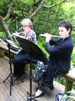 Two flutists performing at Lion's Bay