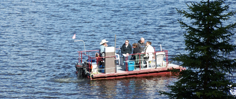 Community meeting held on a boat on Bestil lake