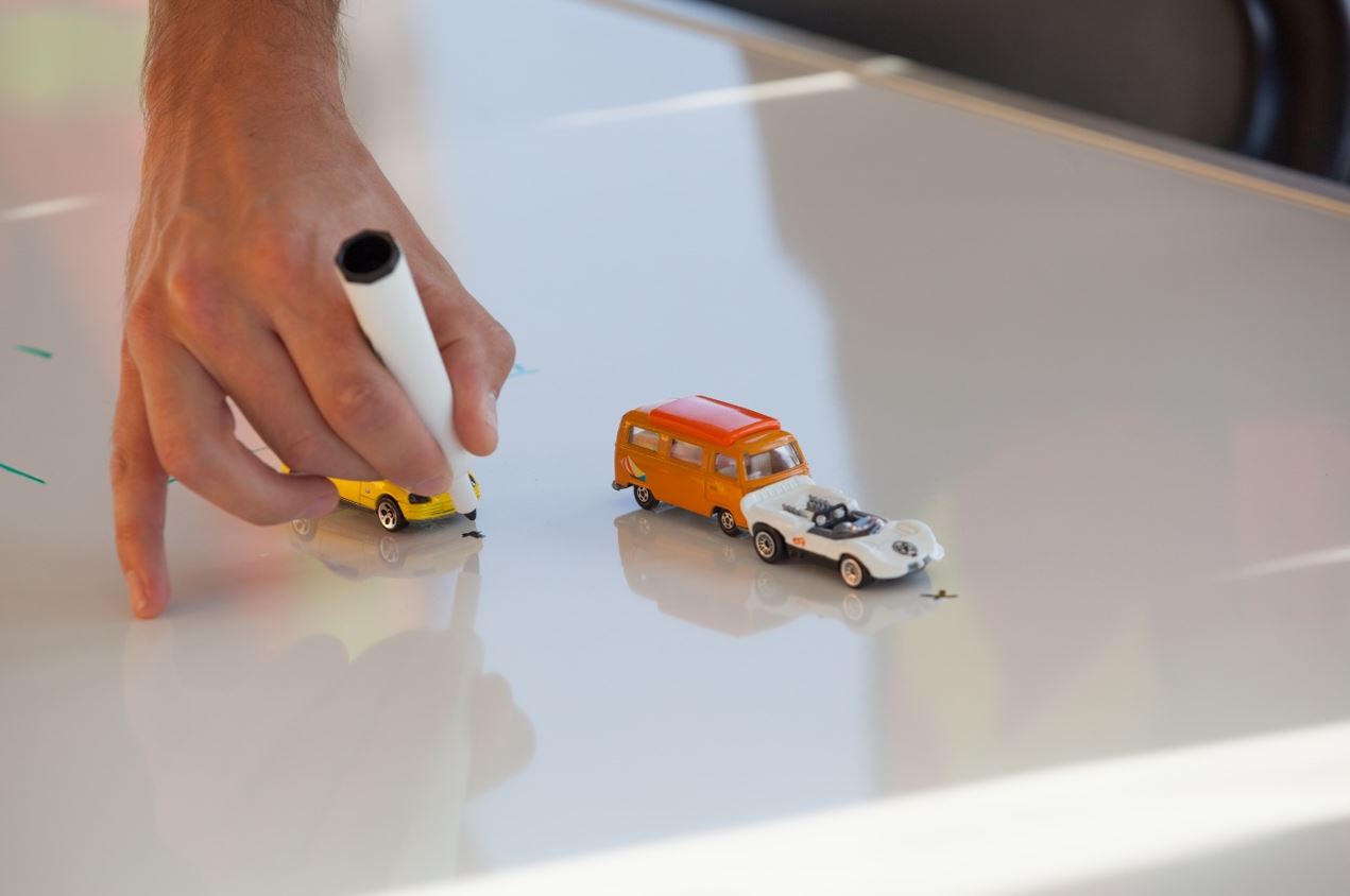 Picture simulation with toy trucks and cars