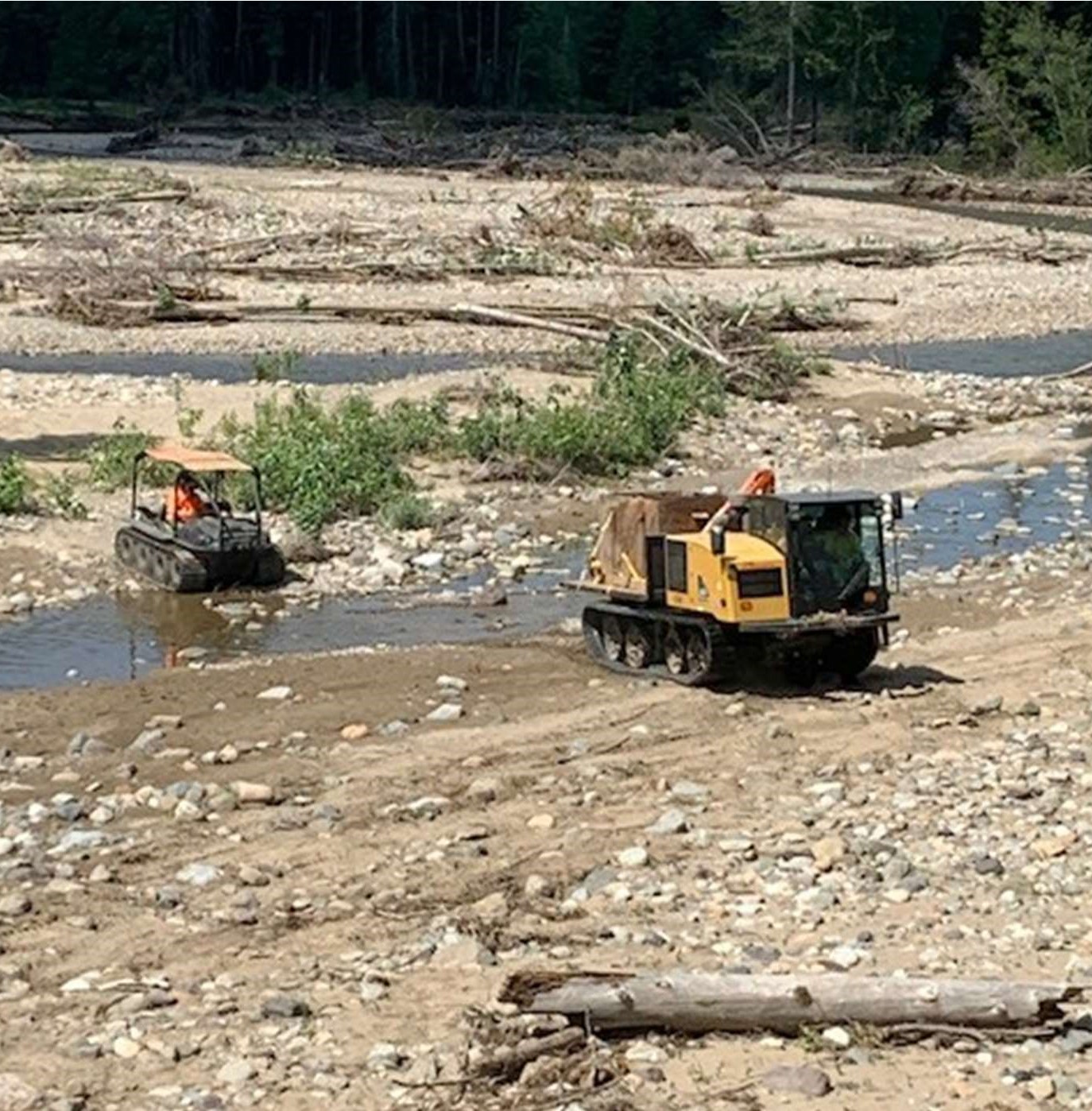 Crews removing small and medium sized debris from the Coldwater River