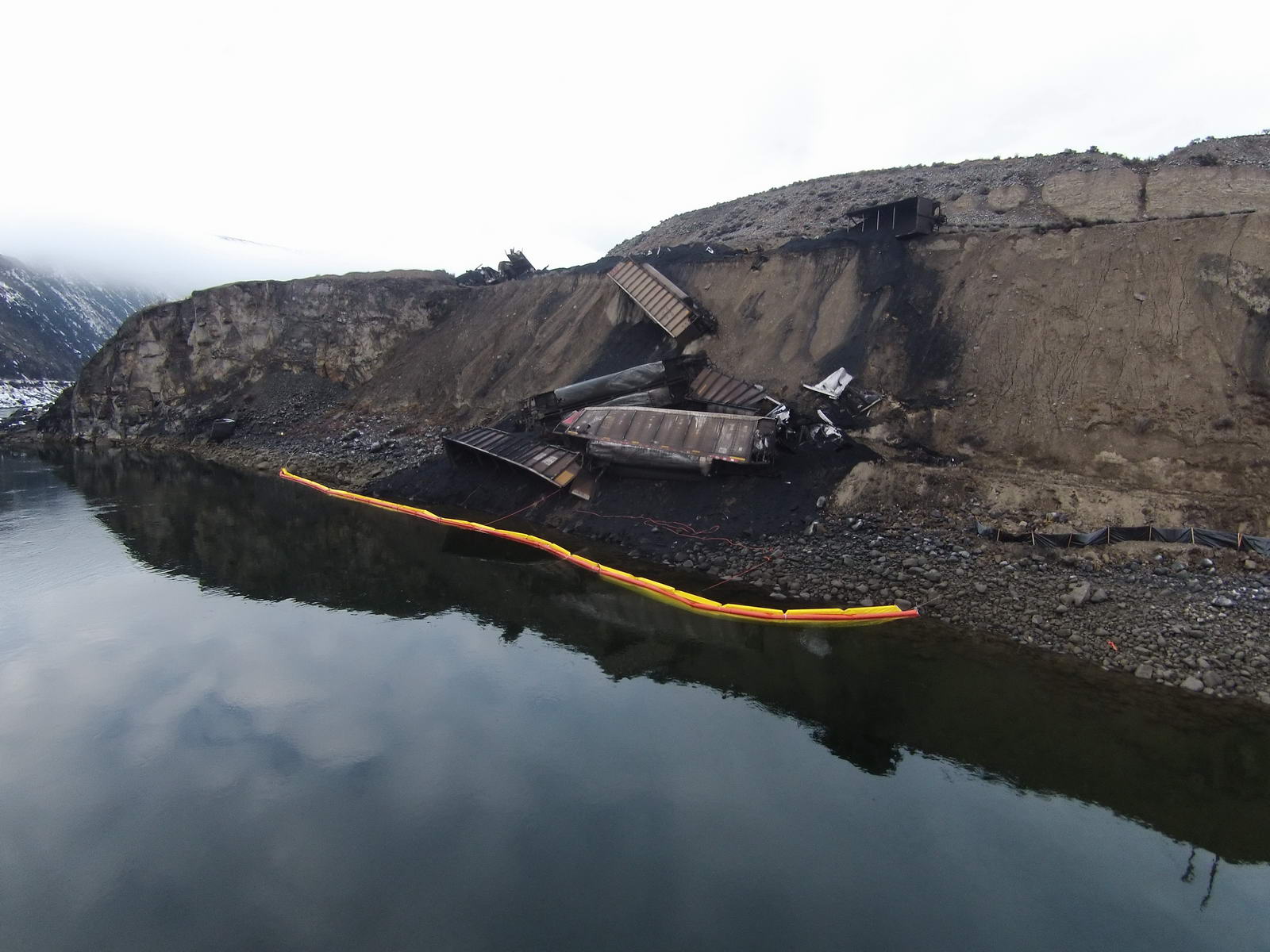 Image of fuel tanker spill near a river