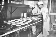 Making pancakes in the cookhouse - Click to zoom