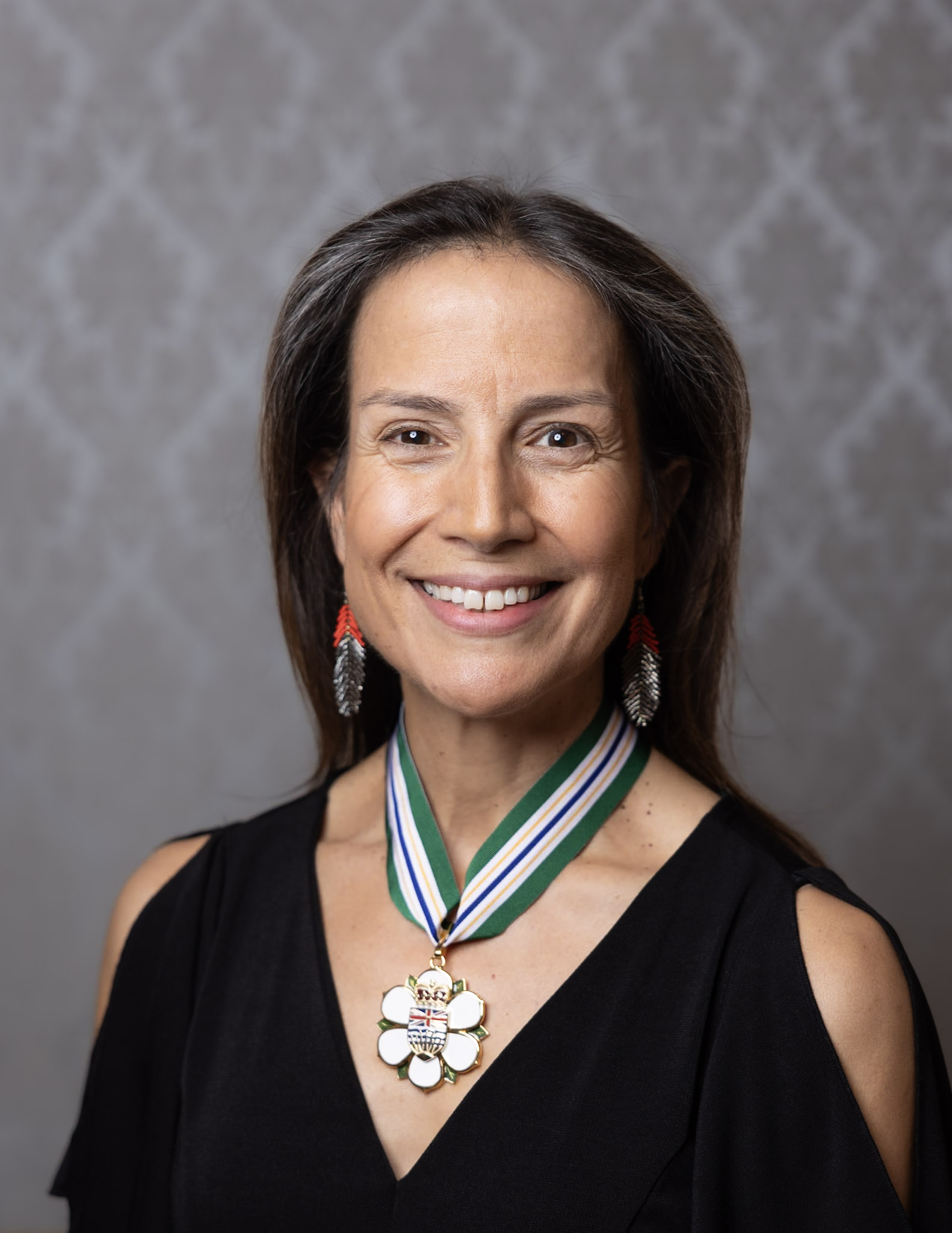 Dr. Nadine Rena Caron