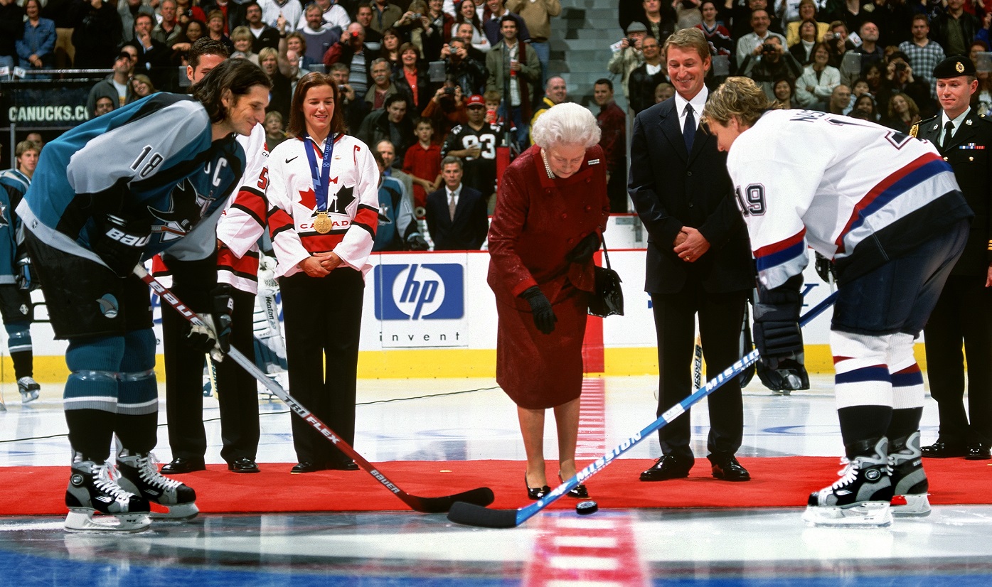Queen Elizabeth dropped the ceremonial puck at the start of an exhibition hockey game at GM Place, Vancouver. 