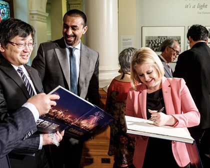 Minister of Tourism, Arts and Culture, Lisa Bear celebrates the publication of the book Celebration: Chinese Canadian Legacies in British Columbia with Legacy Initiatives Advisory Council Co-Chair Henry Yu and Parliamentary Secretary for Sport and Multiculturalism, Ravi Kahlon on March 13, 2018.