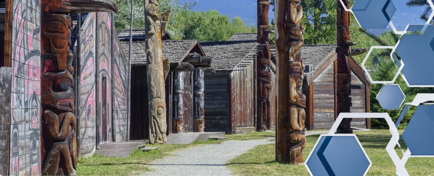 Buildings with Indigenous art and totem poles