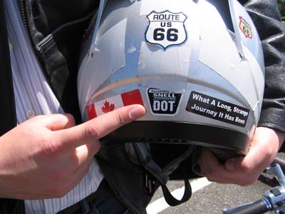 Image showing 'dot' sticker on the back of a motorcycle helmet.