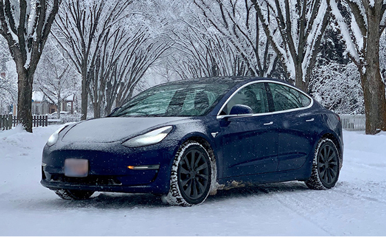 Image of electric vehicle car in the snow.