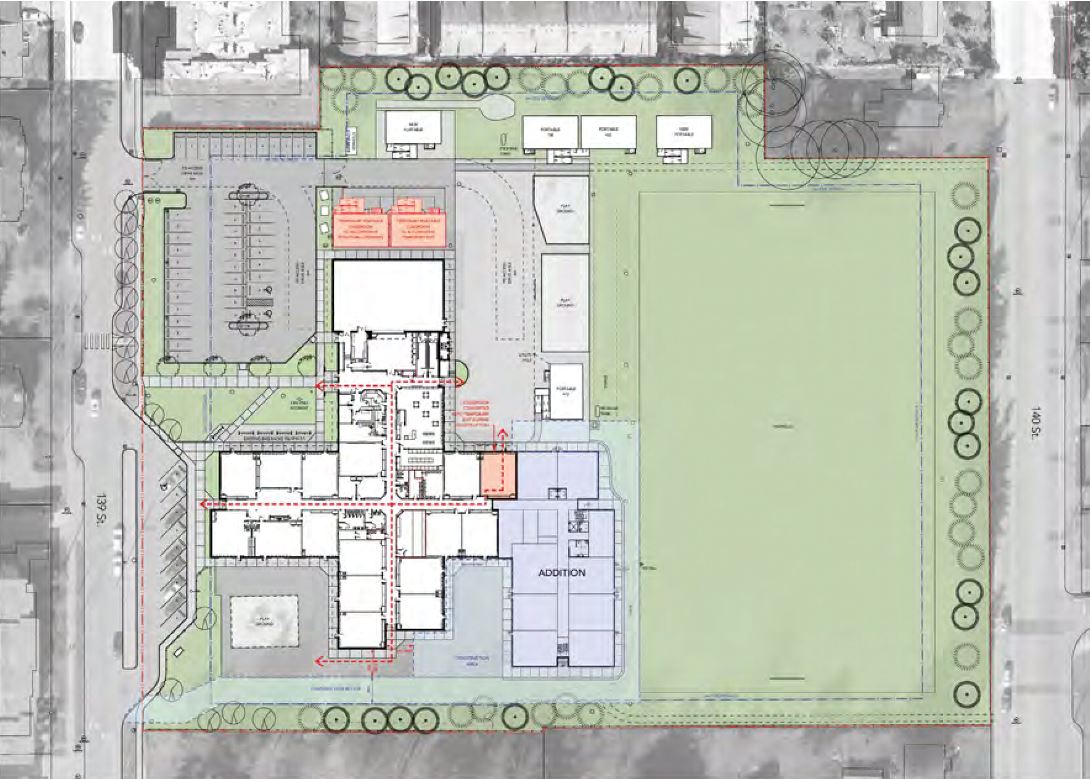 Site plan with new additions highlighted in red, indicating areas of expansion or renovation.