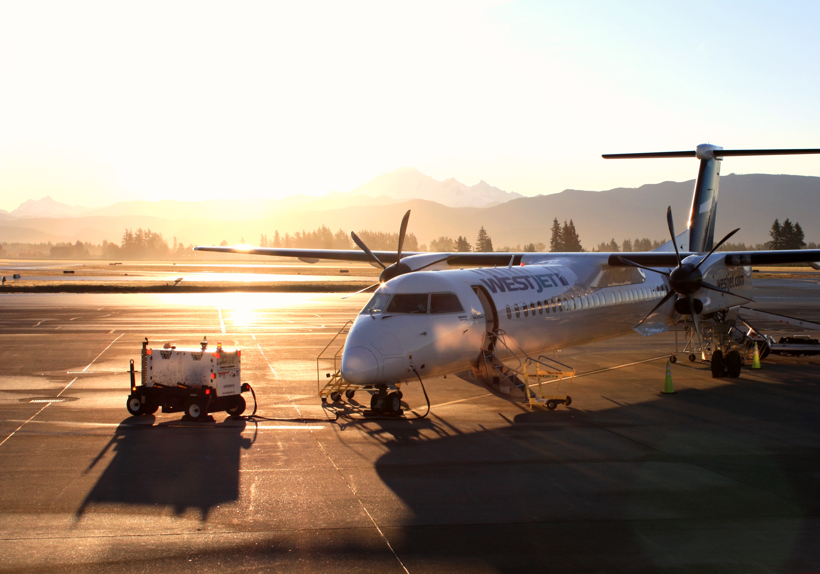 Westjet plane in sunrise