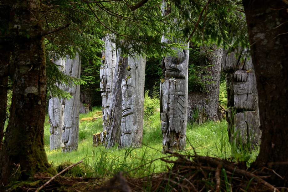 Ancient Haida totems at SGang Gwaay Llnagaay, Gwaii Haanas National Park, Haida Gwaii. 