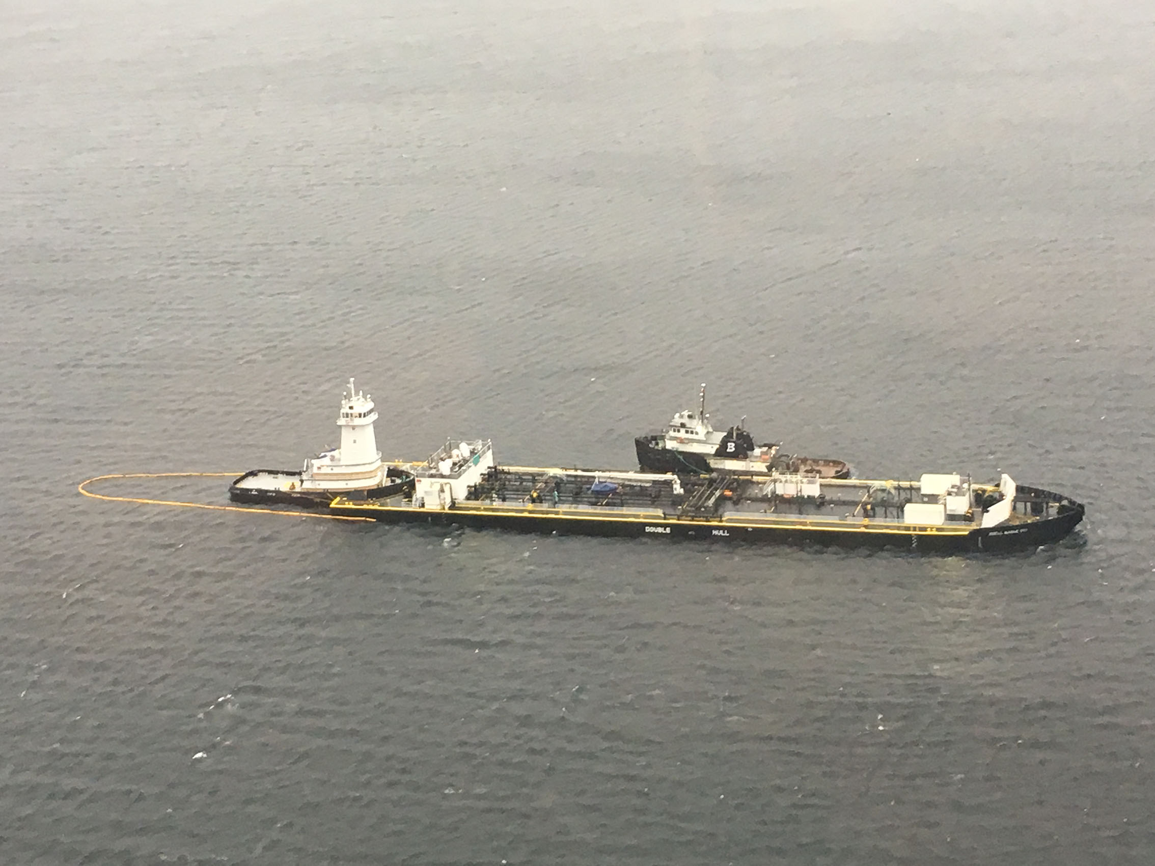 Jake Shearer and fuel barge anchored in Norman Morrison Bay