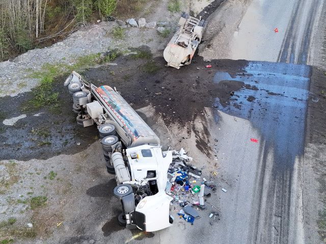 truck on side and spill on highway