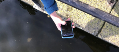 Taking a photo of an algae bloom