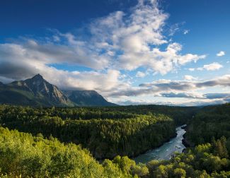 View of mountains, forest and river in Skeena Region.