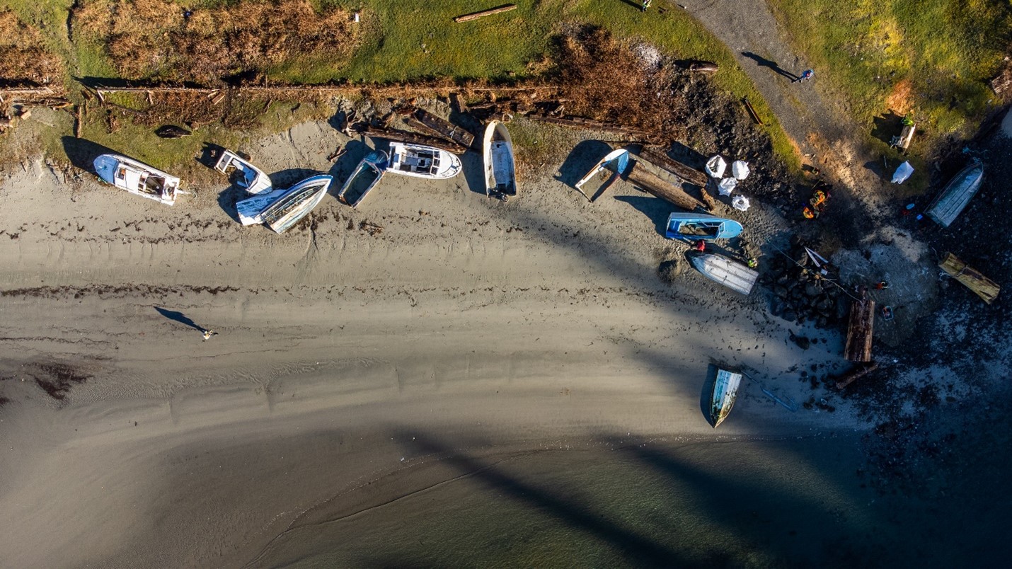 Aerial view of derelict vessels on shore