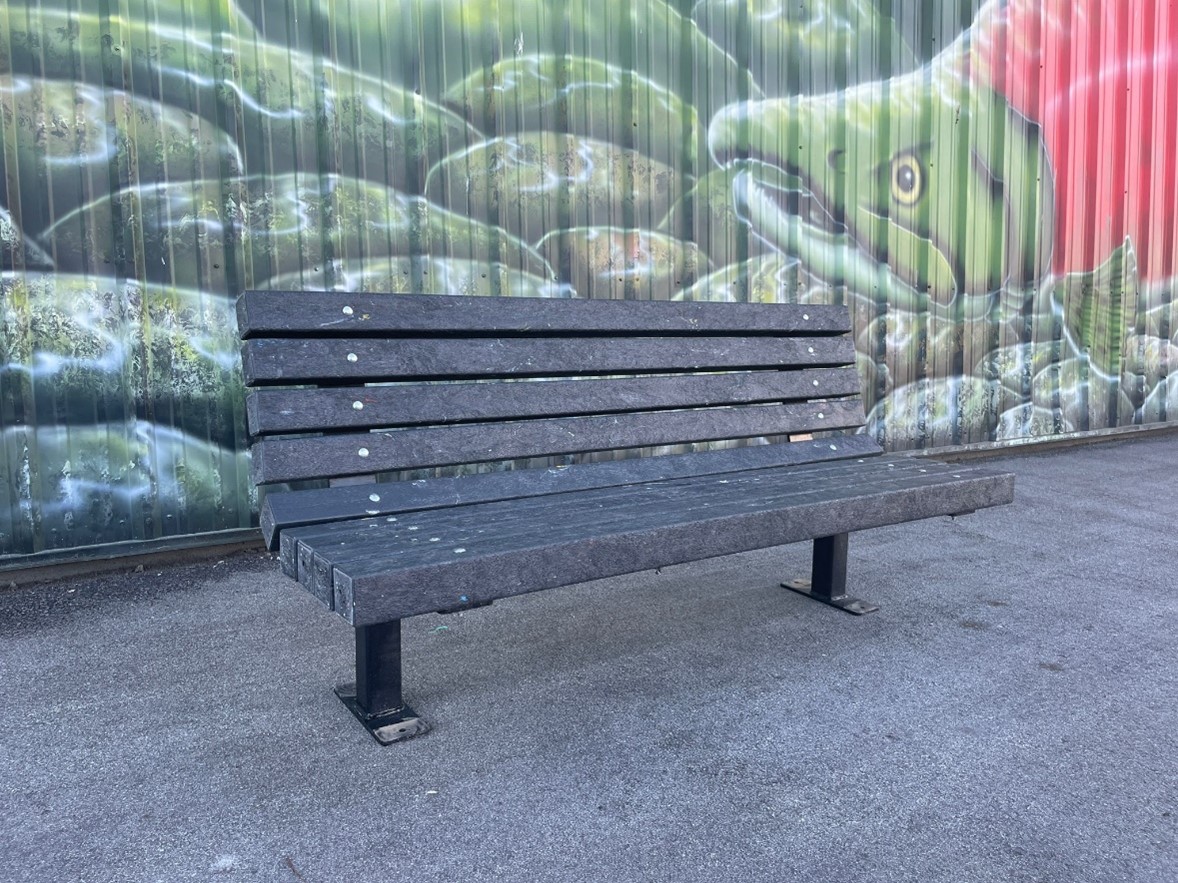 A park bench made from recycled plastic lumber