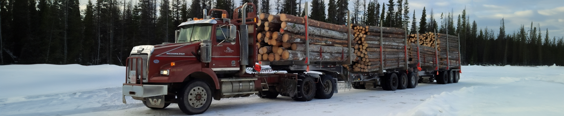 9-Axle Log Haul in Winter