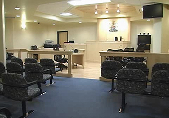 Unlike in traditional courtrooms, the judge’s bench in community court is lower so the judge and the accused are at eye level.