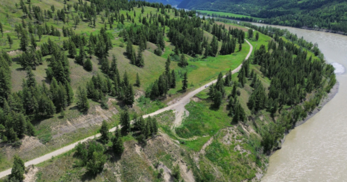 Aerial view of Soda Creek-MacAlister Road above the Fraser River. 
