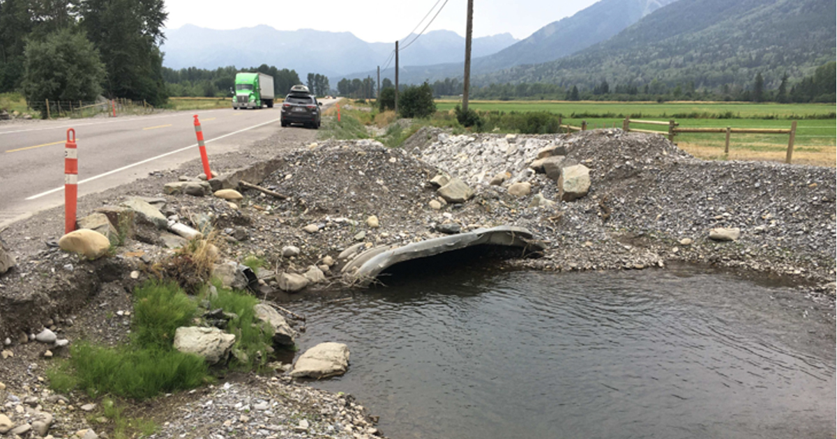 Hatley Creek fowing under highway Highway 3 showing damage 